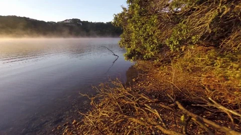 Sunrise in Steamy Lake Stock Footage 76865093