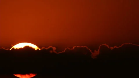 Sunrise sun behind clouds Stock-Footage 86427486