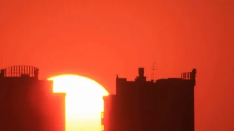 Sunrise sun between towers Stock Footage 81453633