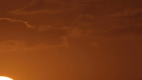 Sunrise sun moving in sky Stock Footage 125911378