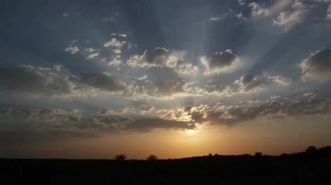 Sunrise with sun rays on the sky Stock Footage 903456