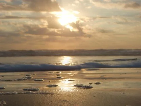 SUNRISE, SUNSET ON THE BEACH Stock Photos