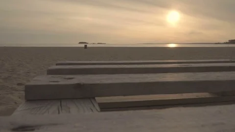 Sunrise/ sunset over a lonely sandy beach/ river bank. Soft colors Stock Footage 84044952