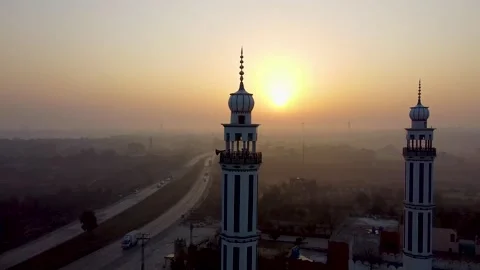 Sunrise sunset of road with traffic with minaret of Masjid in Pakistan  (3) Stock Footage 199246341