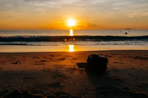 Sunrise, sunset of the sun through the clouds, tropical area near  sea. Stock Photos