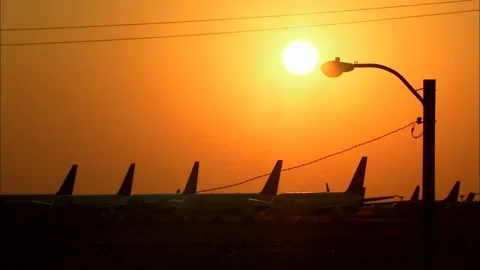 Sunrise to Sunset Time-Lapse Over Hills and Airport Stock Footage 327266411