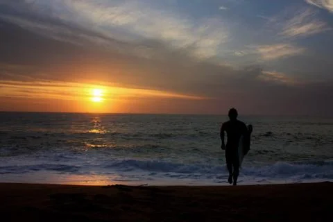 Sunrise Surfer Stock Photos