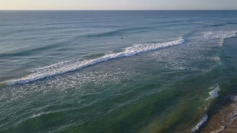 Sunrise Surfers Stock Footage 114842441