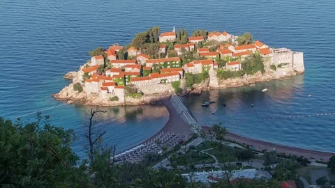Sunrise Sveti Stefan Montenegro Sea Boats Time Lapse Zoom Out 4k Stock Footage