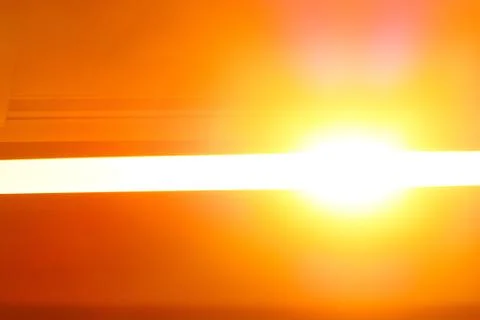 Sunrise through ajar window. 库存照片
