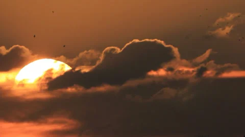 Sunrise through black cloud Stockbeeldmateriaal 33215094