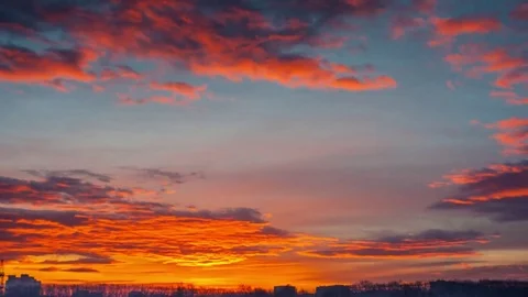 Sunrise through the clouds in the city Stock Footage 84846804