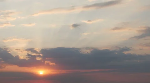 Sunrise through the clouds. Fast moving clouds Video stock 51072142