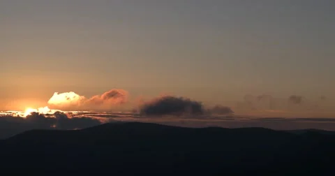 Sunrise Through Flowing Cloud Waves, Mountain Time Lapse Pan Stock Footage 65412087