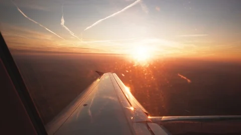 Sunrise Through Plane Window, Passenger POV Aerial Stock Footage 97922678