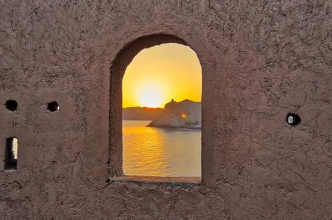 Sunrise through the window Stock Photos