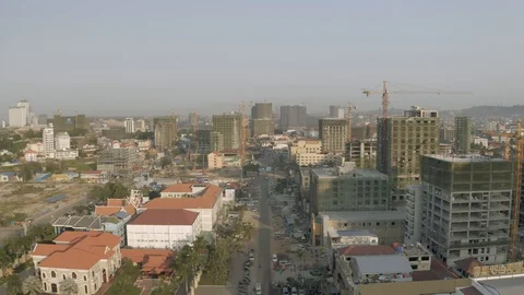 Sunrise time Construction Cranes and building process 4K Drone shot Видео 119366534