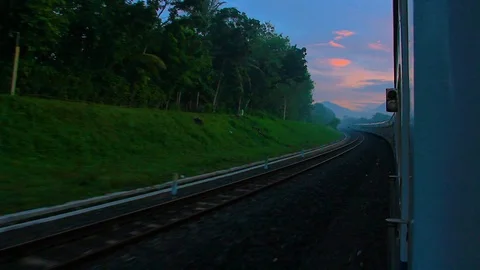 Sunrise time journey on a train Stock Footage 105179207