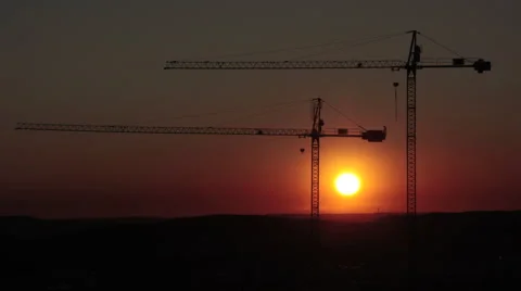 Sunrise time lapse with construction cranes Stock Footage 54171061