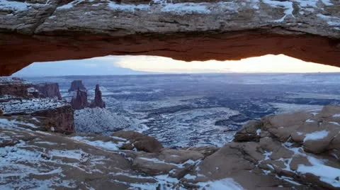 Sunrise time-lapse at Mesa Arch in the snow, Canyonlands. Stock Footage 12669952