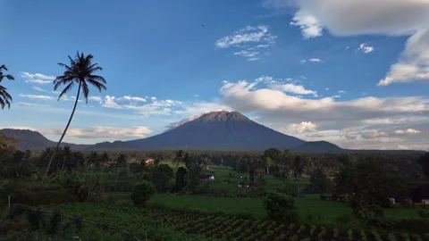 Sunrise time lapse of Mt. Agung over rice fields, Bali, Indonesia Video stock 336483741