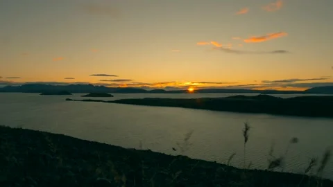 Sunrise time lapse over a mountain lake. Stock Footage 136001178