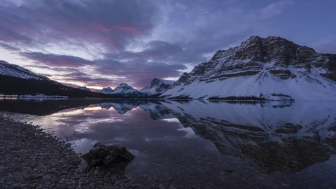 Sunrise time lapse at reflective Bow lake Stock Footage 85411911