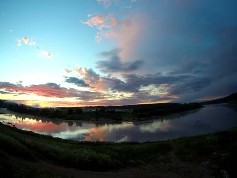 Sunrise time lapse on the river Stock Footage 77672808