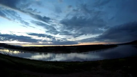 Sunrise time lapse on the river Stock Footage 77672999