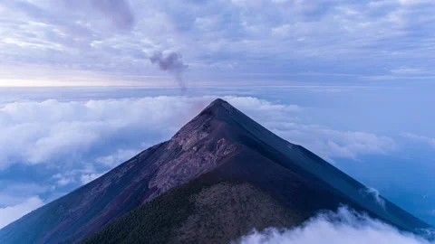 Sunrise time lapse of volcano El Fuego during a eruption with fumarole Guatemala Stock Footage 154616335