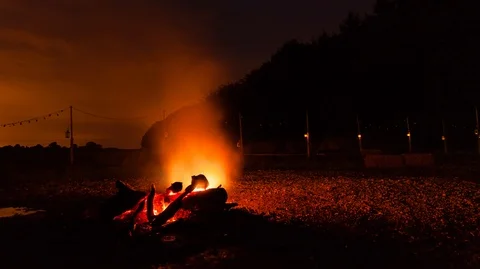 Sunrise Timelapse With Campfire 4K Stock Footage 99729250