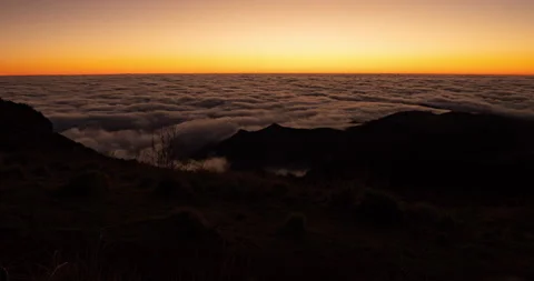 Sunrise timelapse with clouds and mountain silhouettes in the island of Madeira Stock Footage 231777311