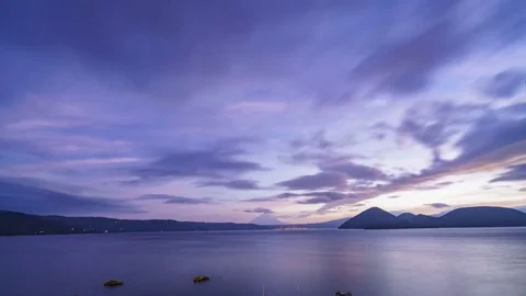 Sunrise timelapse of the famous Lake Toya with Mount Yotei Stock Footage