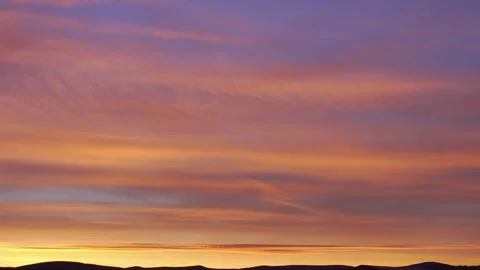 Sunrise timelapse featuring transition from dawn to bright morning light. Stock Footage 265859333