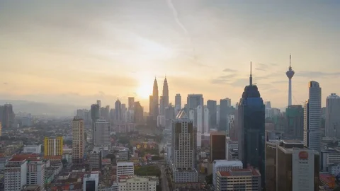 Sunrise timelapse from high vantage point overlooking Kuala Lumpur cityscapes 库存影片 80676470