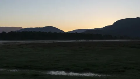 Sunrise Timelapse Mist Over Marsh Pulling Away Stock Footage 138472331