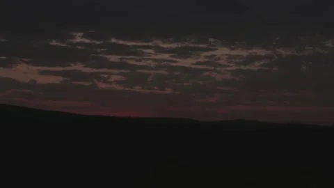 Sunrise timelapse over fields and hills Stock Footage 227150835