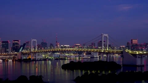 Sunrise Timelapse of Rainbow Bridge in Tokyo, JapanRainbowBridge Sunrise Stock Footage 340465248