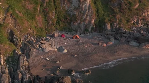 Sunrise at Tiny Hidden Beach in. Howth06 - 4K Cinematic Drone Footage - Stock Footage 284325211