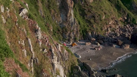 Sunrise at Tiny Hidden Beach in. Howth23 - 4K Cinematic Drone Footage - Stock Footage 284325572