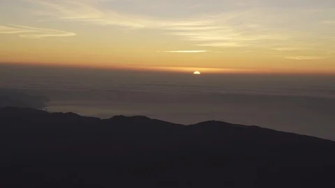 Sunrise from top of the El Teide volcano, El Teide National Park, UNESCO World Stock Footage