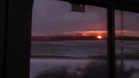 Sunrise train window reflection Stock Footage 156258568