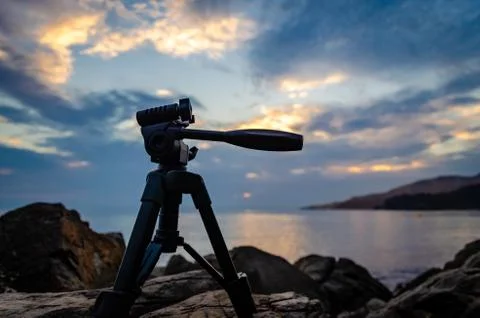 Sunrise with a tripod. Stock Photos