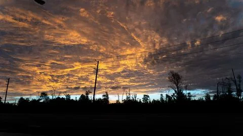 Sunrise Under Low Clouds in Florida Panhandle Stock Photos