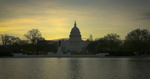 Sunrise at US Capitol Building Stock Footage 334678451