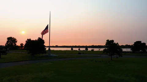 Sunrise US Flag Half Mast Detroit Belle Isle Patriotic Memorial Stock Footage 249284494