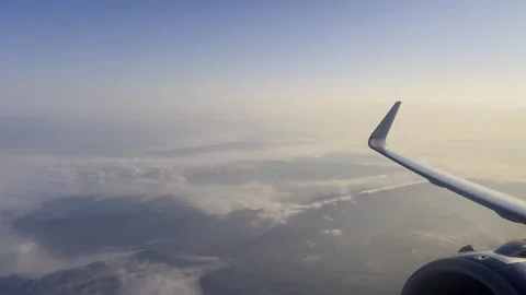 Sunrise view from airplane window Stock Footage 284572997
