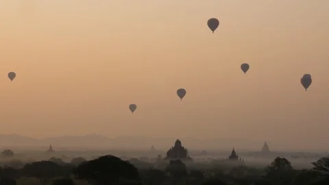 Sunrise view balloons above the temples of Bagan, Myanmar/Burma Stock Footage 95272720