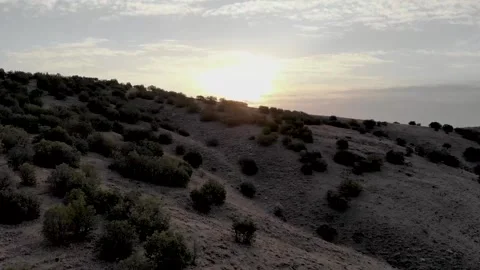 Sunrise view from behind the mountains Video stock 144976499