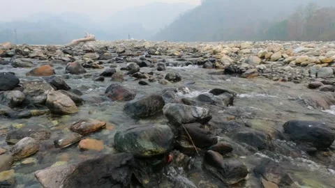 Sunrise view of Jayanti river at Buxa Tiger Reserve Stock Footage 274239363